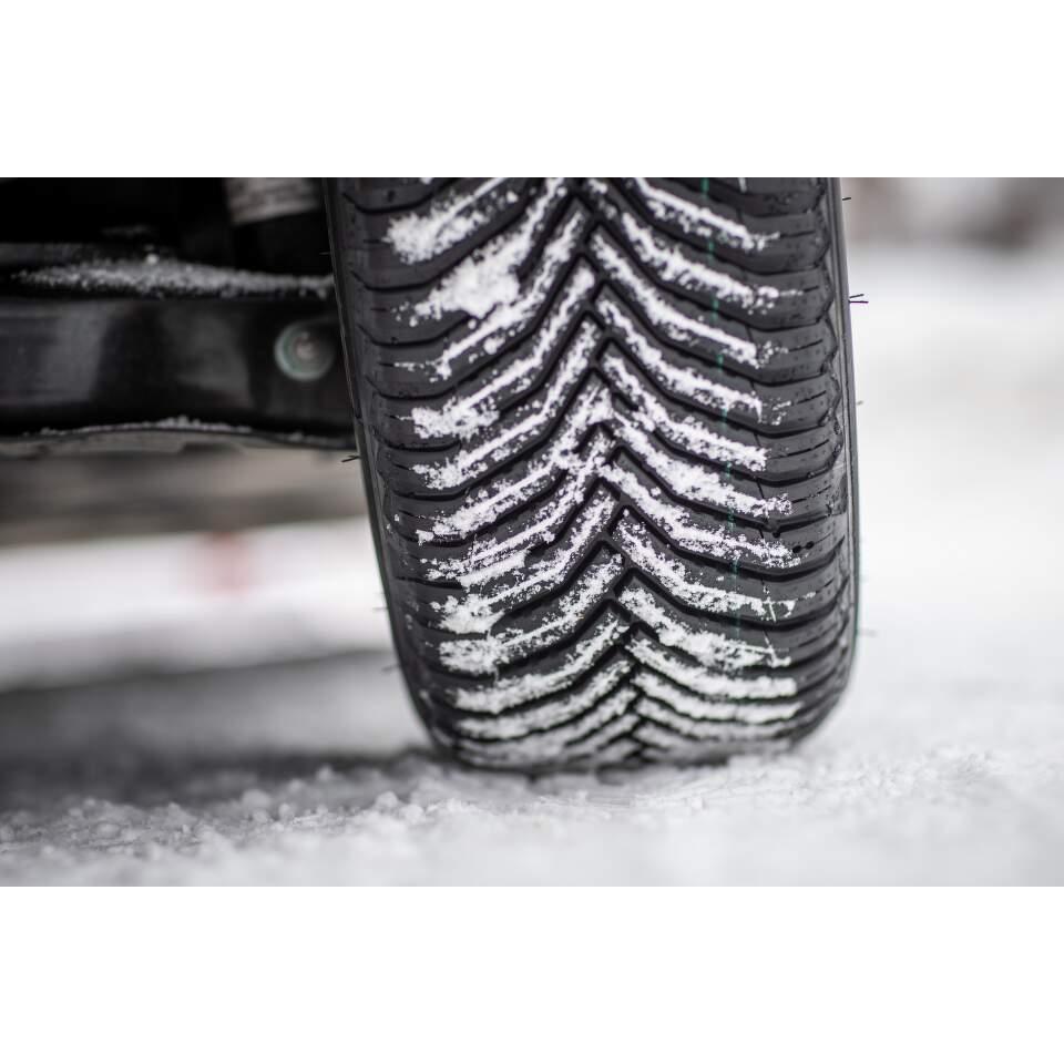 Michelin CrossClimate 2 V-shaped tread blocks on a car driving through light snow